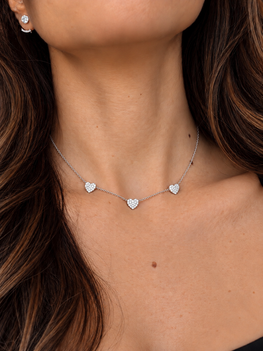 14k White Gold Three Hearts Diamond Necklace .20ctw